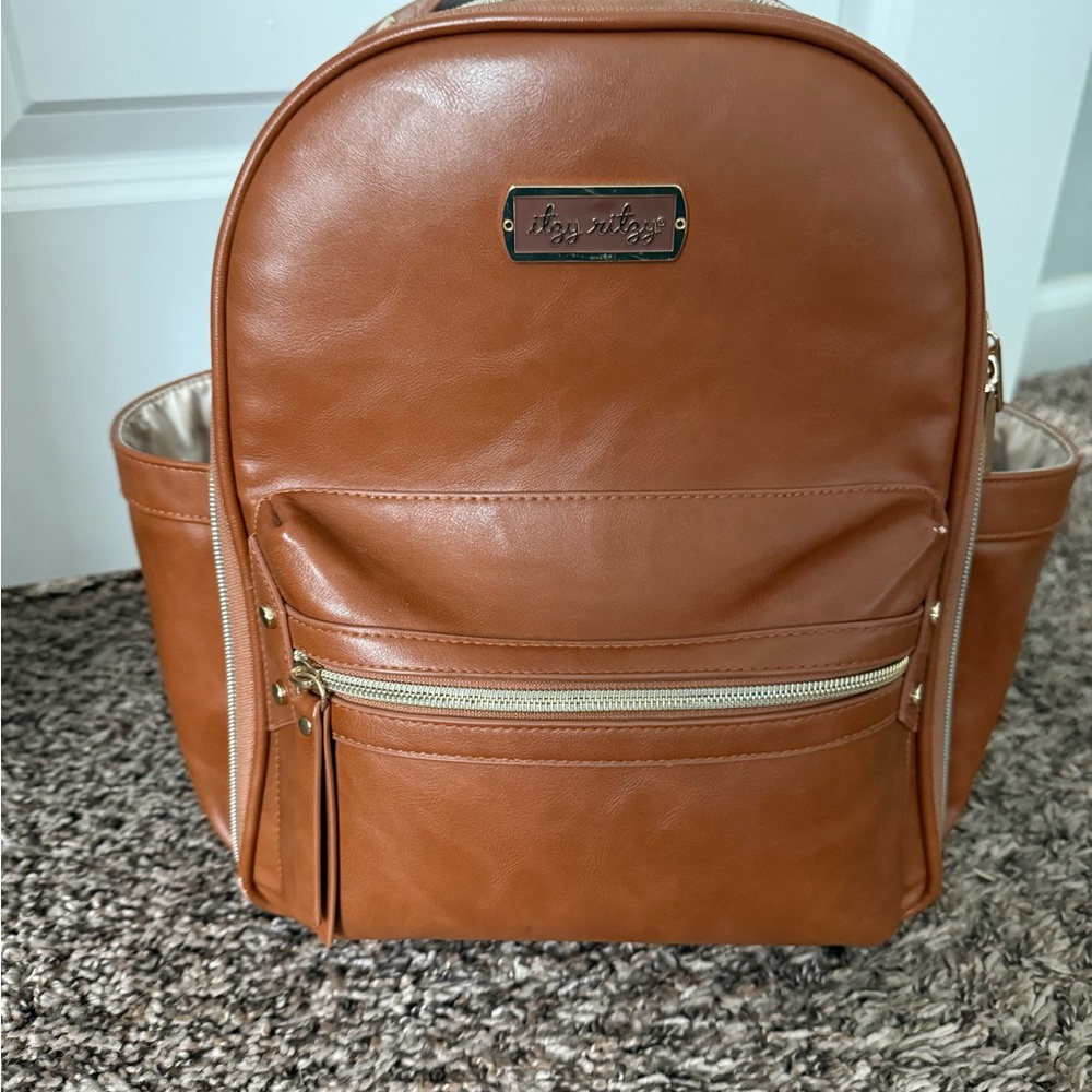 Itzy Ritzy Tan Backpack with Structured Design